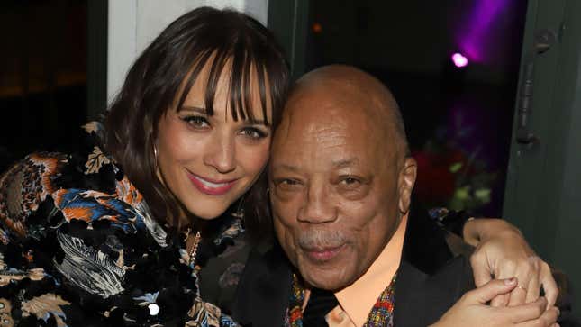 Rashida hugging Quincy Jones at event